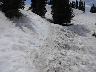 Bumpass Hell trail covered with snow at Lassen Volcanic National Park