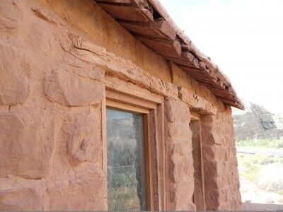 the window frame of Behunin Cabin Capitol Reef